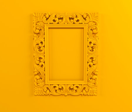 Yellow carved openwork frame for picture or photo on yellow orange background. minimal border composition. Frame with classic pattern, art deco, trend color. creative background. template for design.の写真素材