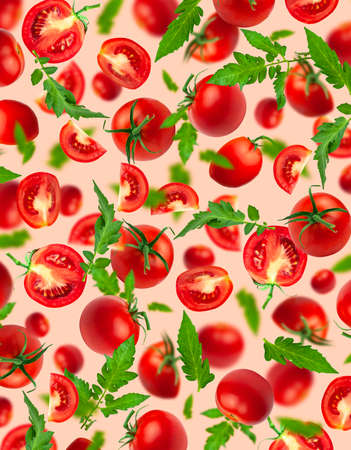 creative food concept. Tomato pattern. Flying red ripe juicy tomatoes and green leaves on pink background. Healthy vegan organic food, vegetable, cherry tomatoes, summer, harvesting.の写真素材