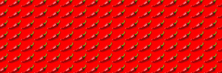 Pattern Red fresh chili pepper isolated on red background. Seasoning for dish, hot pepper, spicy...