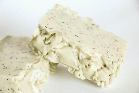 Bars of natural organic soap on white background. Handmade soap making. Spa products and skin care...