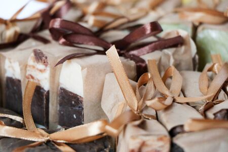 A set of natural cosmetics of body care in gift wrap: soap, cream, jar shampoo, conditioner, shower gel, scrub, lotion isolated. Beauty treatment. on white backgroundの写真素材