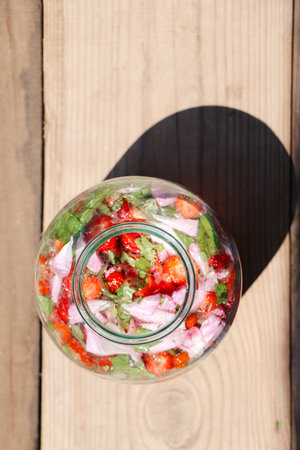 Preparation homemade refreshing strawberry and lime lemonade with mint