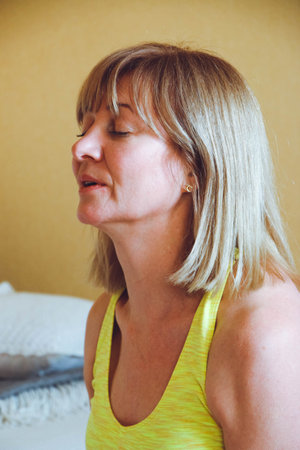 adult beautiful Woman practicing home yoga. A series of yoga poses. healthy lifestyle concept,...