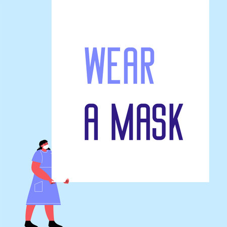 A woman holding a banner saying wear a mask
