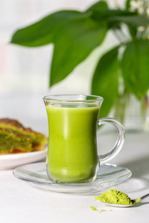 Japanese green tea Matcha with coconut milk and frangipane tart with almond, te matcha and apricot...