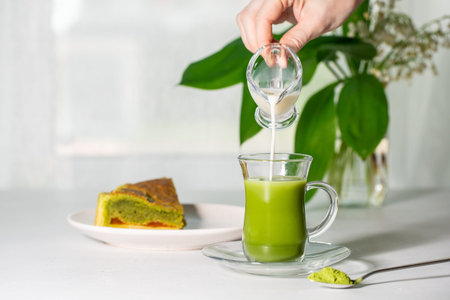 Japanese green tea Matcha with flowing coconut milk.の写真素材