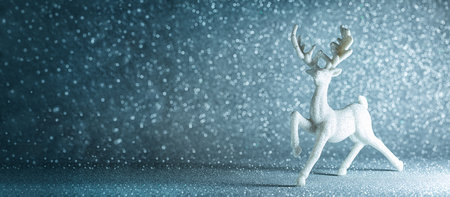 Christam or New Year holiday glowing background. White Christmas Deer toy or Reindeer, festive sparkles and light, glitter, blue and white colors. Copy space for gritting text.の写真素材