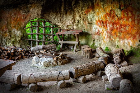 Reconstruction of Prehistoric, paleolithic cave or cavern, Parco delle Cascate, Italy, Garda lake, Molina village, Italy.の写真素材