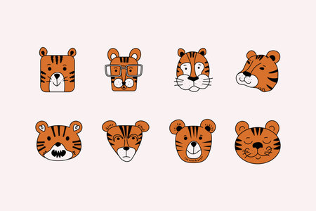 Tigers cartoon collection. Set of muzzles of tiger cubs. Vector icons on isolated background.のイラスト素材