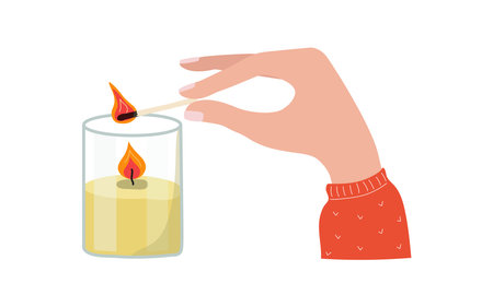 Female hand with a burning match and a candle in a glass jar. Burning wax cozy candle, flame. Man lights a fire. White background. Element of home interior. Decorations, decor, coziness.のイラスト素材
