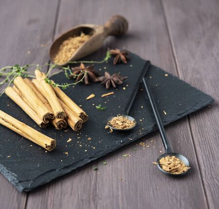 brown table anise stars rustic close up spicy aromaの写真素材