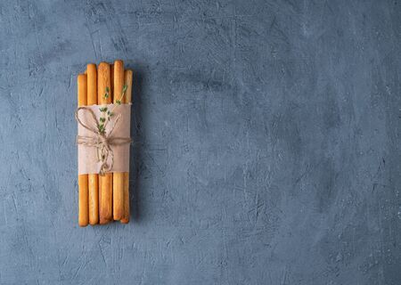 italian stick bread grissini traditional top view blue tableの写真素材