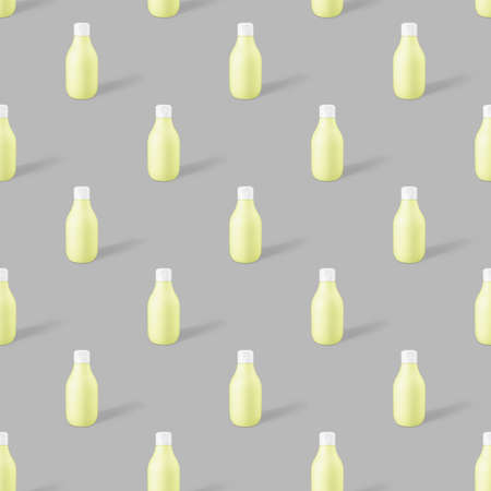 seamless pattern of yellow biodegradable plastic cosmetic bottle mockup on a trendy gray background. Concept photoの写真素材