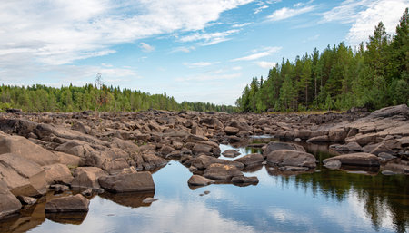 Stone River. Summer landscape of a river with rocks and forest in Belomorsk, Karelia, Russia....