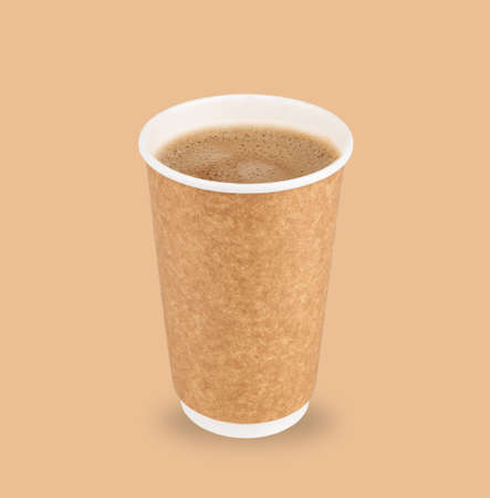Black aromatic coffee in a paper craft cup on a brown background. The concept of eco and zero waste. Eco-friendly use. Mock up and copy space.の写真素材