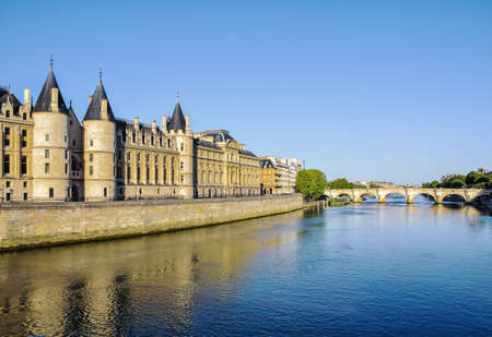 Beautiful panoramic view from the Seine River to the bridge and the city landscape on a sunny summer day. Paris, France.の写真素材