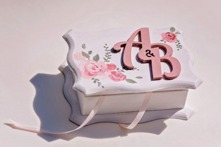 The handmade casket with marriage couples monogram