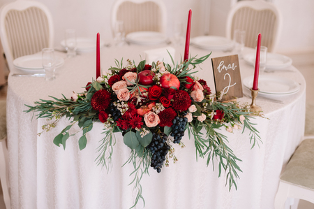 Glorious autumn bouquet on guest wedding tableの写真素材