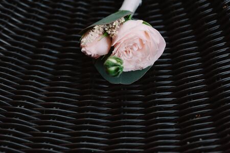 Beautiful boutonniere made from the light pink roseの写真素材