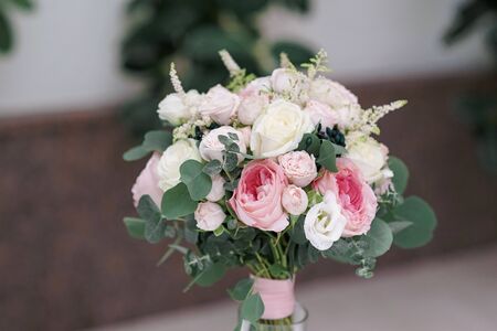 Wedding flowers, bridal bouquet closeup. Decoration made of roses, peonies and decorative plants, selective focus, nobody, objectsの写真素材