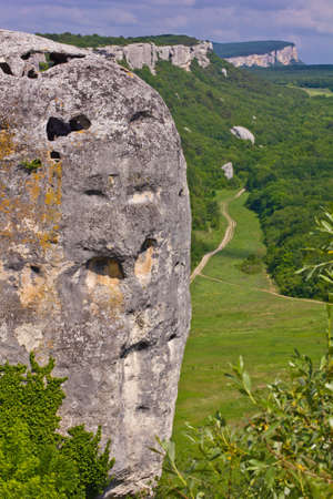 Crimean mountain landscape, the foreground rock like a human headの写真素材