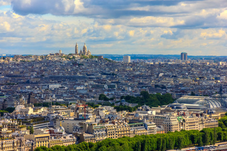 View of Paris, the hill Montmartre and the Sacre Coeur Basilica from the Eiffel towerの写真素材