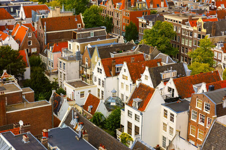 Roofs and facades of Amsterdam  City view from the bell tower of the church Westerkerk, Holland, Netherlands の写真素材
