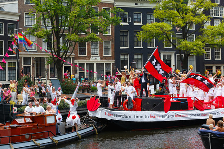 Amsterdam, Netherlands - August 2, 2014: Participants at the famous Canal Parade of the Amsterdam Gay Pride 2014. Every year the parade is visited by more than 400000 people.のeditorial素材