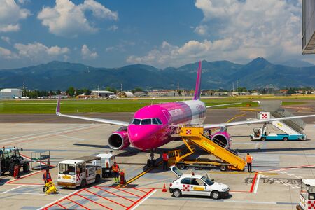 Bergamo, Italy - May 27, 2015: Preparation of aircraft Wizzair in airport Bergamo to fly. Wizzair is one of the largest low-cost European airline by scheduled passengers carried.のeditorial素材