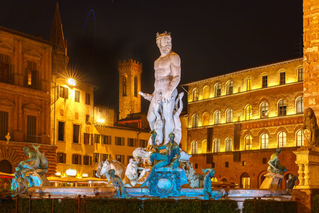 Fountain of Neptune by Bartolomeo Ammannati on  Piazza della Signoria in Florence at night, Italyの写真素材