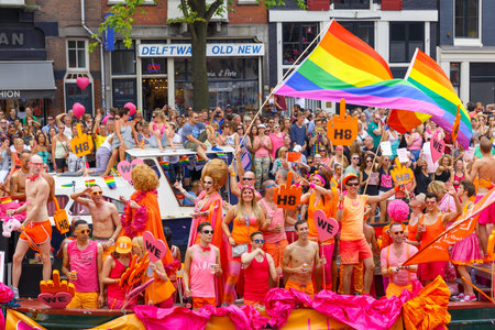 Amsterdam, Netherlands - August 2, 2014: Participants at the famous Canal Parade of the Amsterdam Gay Pride 2014. Every year the parade is visited by more than 400000 people.のeditorial素材