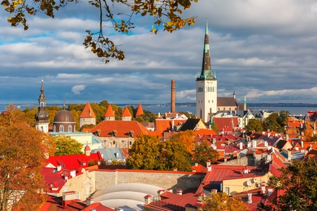 Aerial cityscape with Medieval Old Town and St. Olaf Baptist Church in Tallinn in autumn day, Estoniaの写真素材