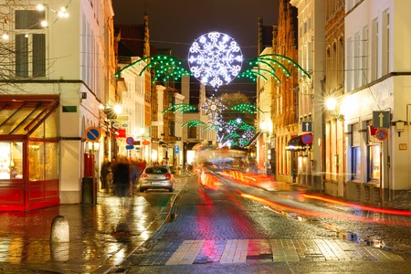 Decorated and illuminated Christmas street in Bruges, Belgiumの写真素材