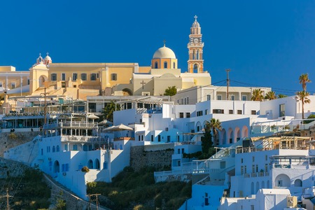 St. Gerasimos Christian Church of Fira, modern capital of the Greek Aegean island, Santorini, in the sunny summer morning, Greeceの写真素材