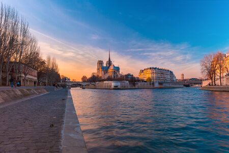 Picturesque cityscape of Cathedral of Notre Dame de Paris at sunset, Franceの写真素材