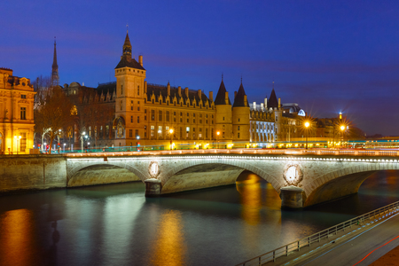 Conciergerie and Illuminated bridge Pont au Change at night, Paris, Franceの写真素材