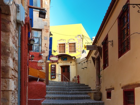 Stairs to the narrow streets of the old town in the sunny morning, Chania, Crete, Greeceの写真素材