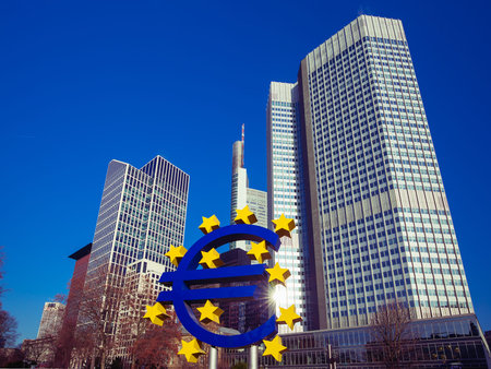 Business and finance concept with giant Euro sign at European Central Bank headquarters in the...