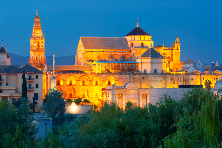 Illuminated Great Mosque Mezquita - Catedral de Cordoba during evening blue hour, Cordoba, Andalusia, Spainの写真素材