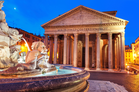 The Pantheon, former Roman temple of all gods, now a church, and Fountain at Piazza della Rotonda, at night, Rome, Italyの写真素材