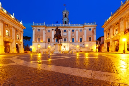 Piazza del Campidoglio on the top of Capitoline Hill with the facade of Senatorial Palace and equestrian statue of Marcus Aurelius at night, Rome, Italyの写真素材