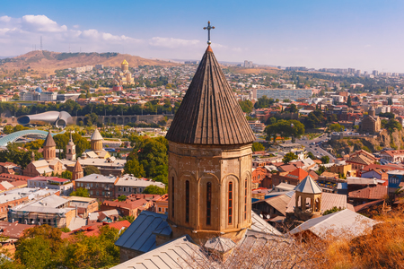 Aerial view of Old Town with dome of Lower Bethlemi Church and Sameba Holy Trinity Cathedral, Metekhi Church, bridge of Peace and Presidential Palace in Tbilisi, Georgia.の写真素材