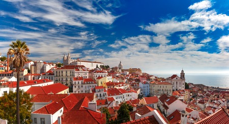 View of Alfama, the oldest district of the Old Town, with Monastery of Sao Vicente de Fora, Church of Saint Stephen and National Pantheon on the sunny afternoon, Lisbon, Portugalの写真素材