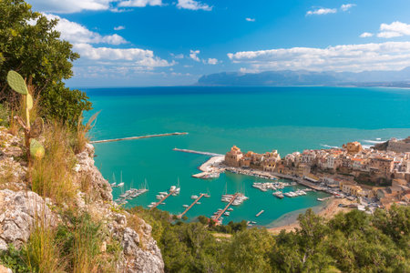 Beautiful panoramic view of medieval fortress in Cala Marina, harbor in coastal city Castellammare del Golfo in the morning, Sicily, Italyの写真素材