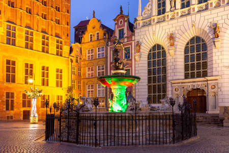 Long Market Street with Fountain of Neptune at night in Old Town of Gdansk, Polandの写真素材