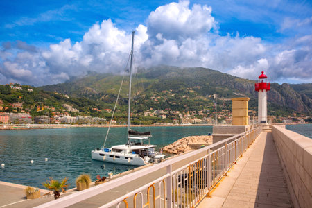 Lighthouse in Old port of Menton, French Riviera, Franceの写真素材