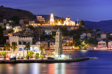Night View of Ano Symi with Annunciation Church and Clocktower, Dodecanese islands, Greeceの写真素材