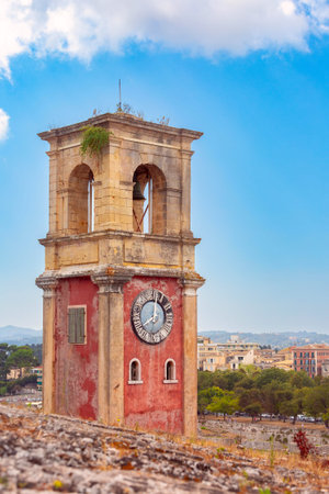 Clock tower and stone walls at Old Venetian Fortress in Kerkyra, Corfu, Greece, with stepsの写真素材