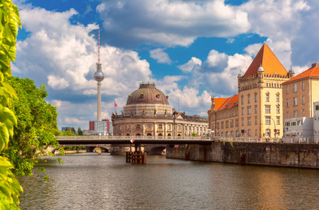 View of Museum Island from the city promenade along the Spree River in Berlin, Germany, on a sunny dayの写真素材