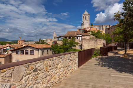 A scenic view of Girona Cathedral and the historic city from the medieval walls in Girona, Spainの写真素材